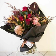 Bouquet in wrapping with water bag